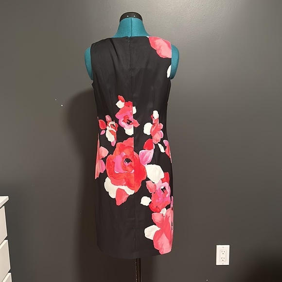 Size 6 unlined mini dress. Very cute on! - Picture 2 of 2